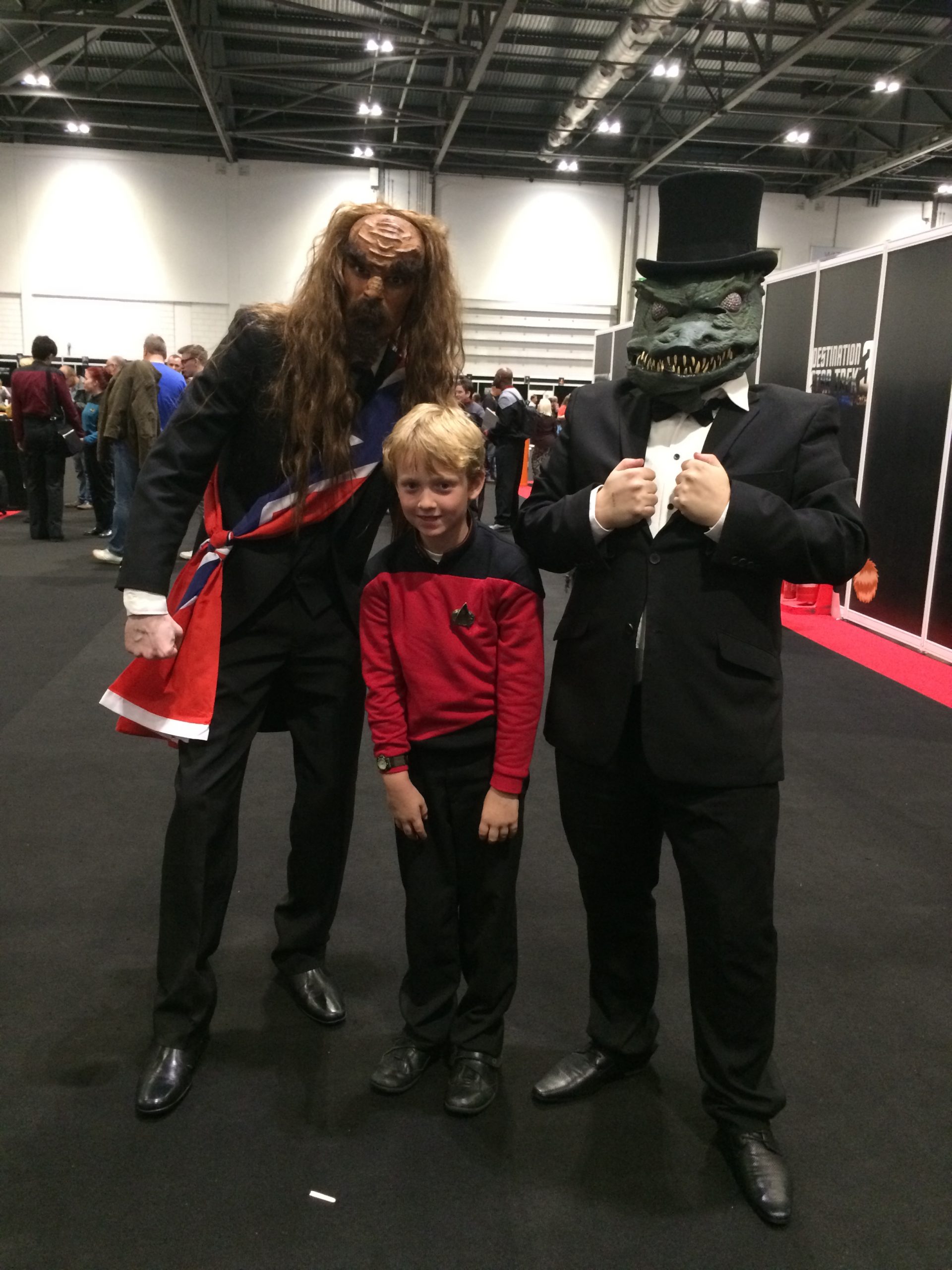 Alison's son in his Star Trek Uniform with a Klingon and a Gorn
