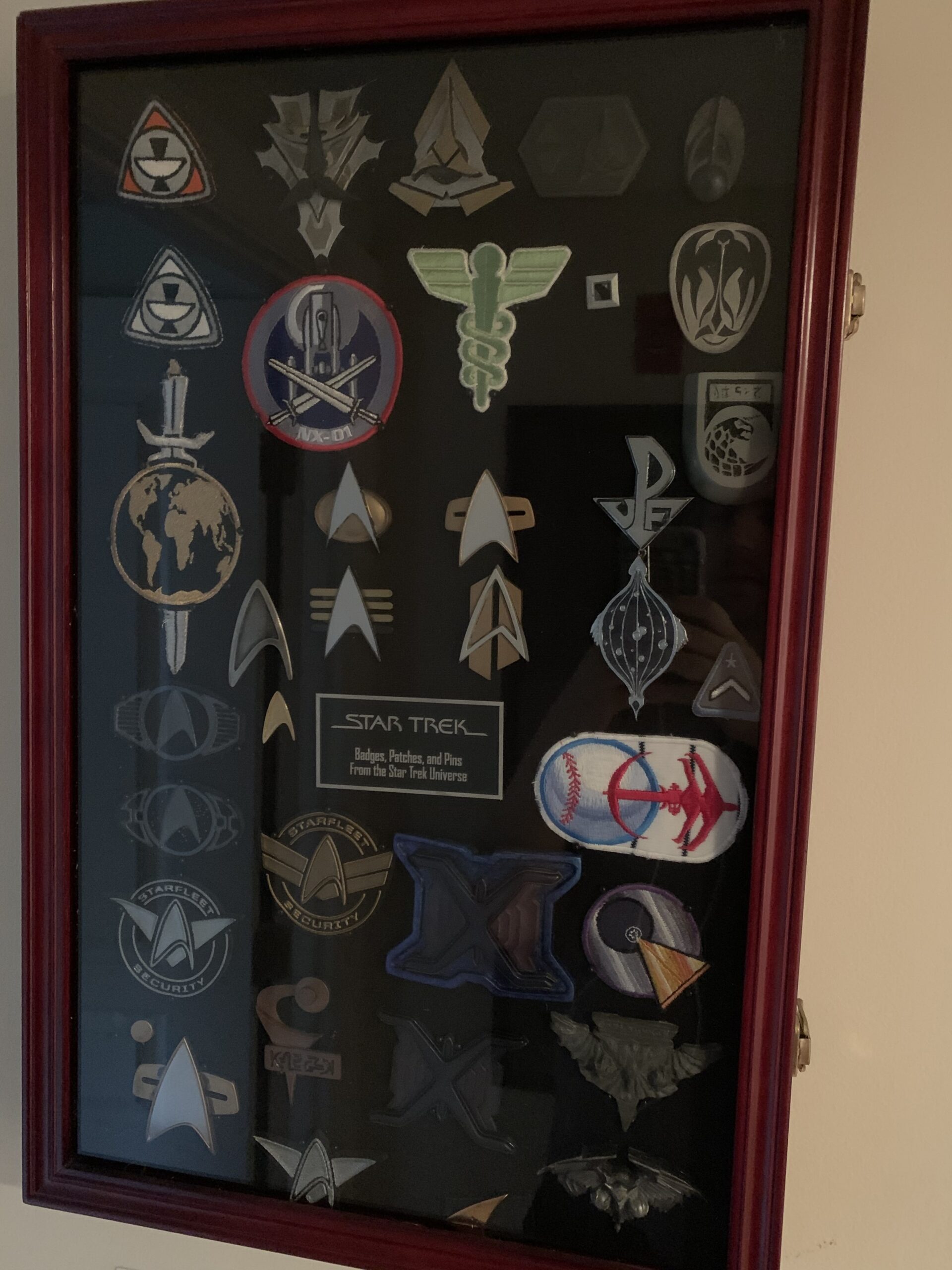 Patches and comm badges as used on screen in Star Trek from Alex Perry's collection