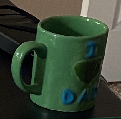 Image of a ceramic mug painted by a child