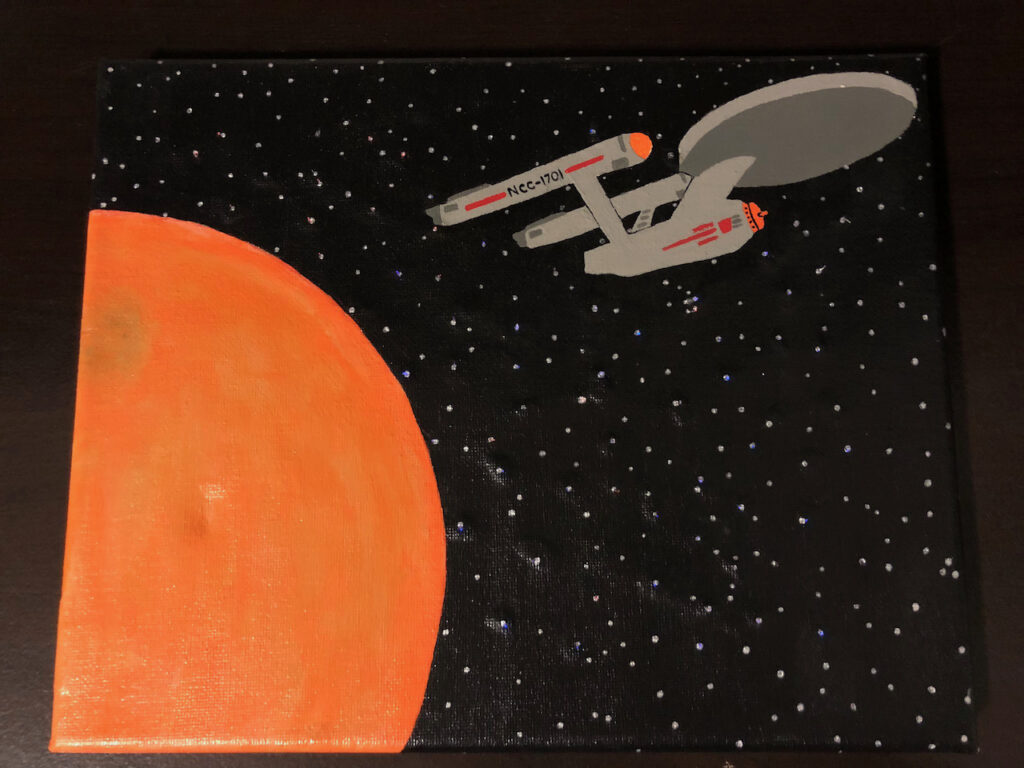 Painting of the Enterprise leaving orbit from an orange planet
