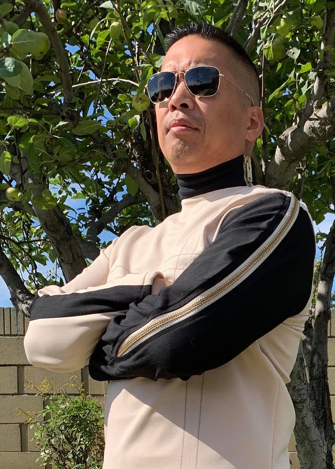 Norman Lao wearing a Space: 1999 uniform