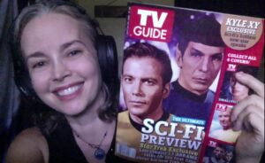 April holding a copy of the TV Guide magazine that spurred her move to Los Angeles.