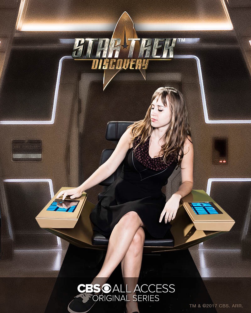 Stephanie sitting in the USS Discovery Captain's Chair