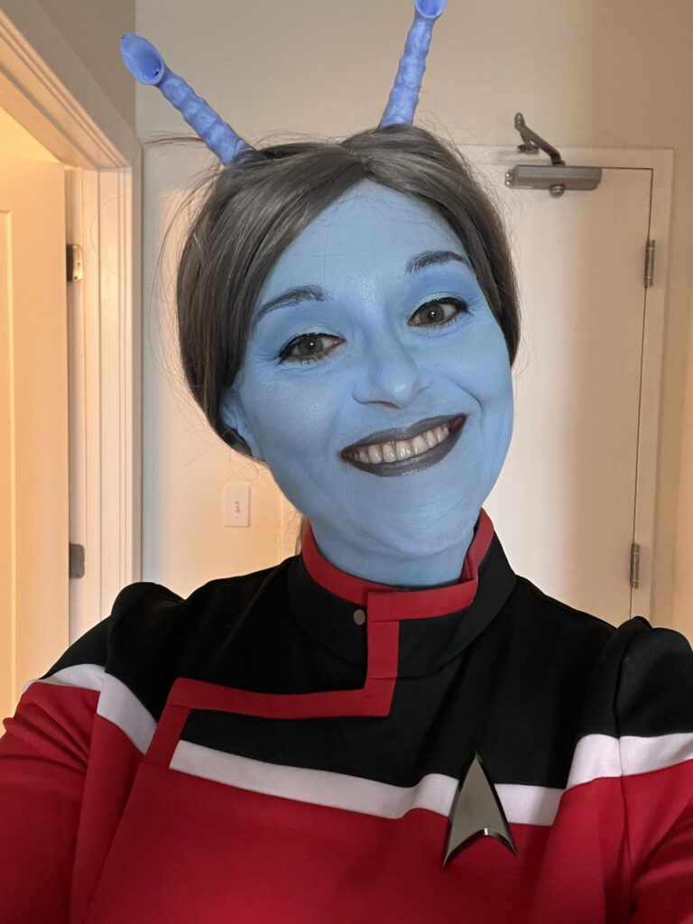 Image of a woman as a blue Andorian in a Star Trek Lower Decks uniform