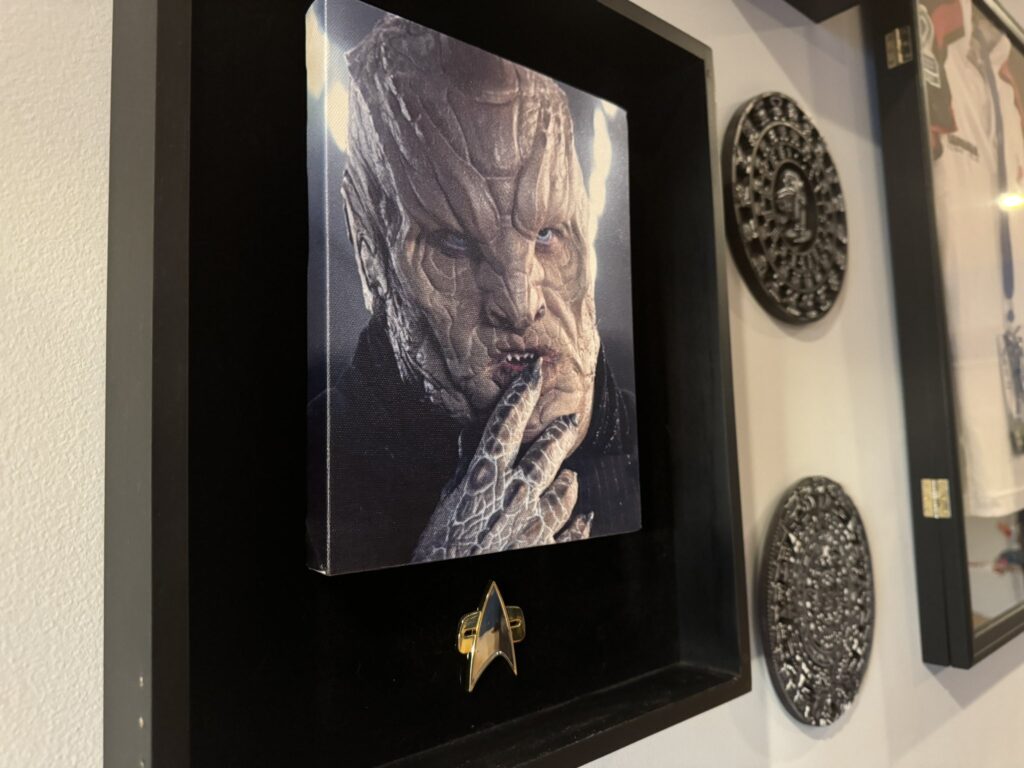 Photo of Mr Vup hanging in Dominic's house with his Star Trek Delta pin