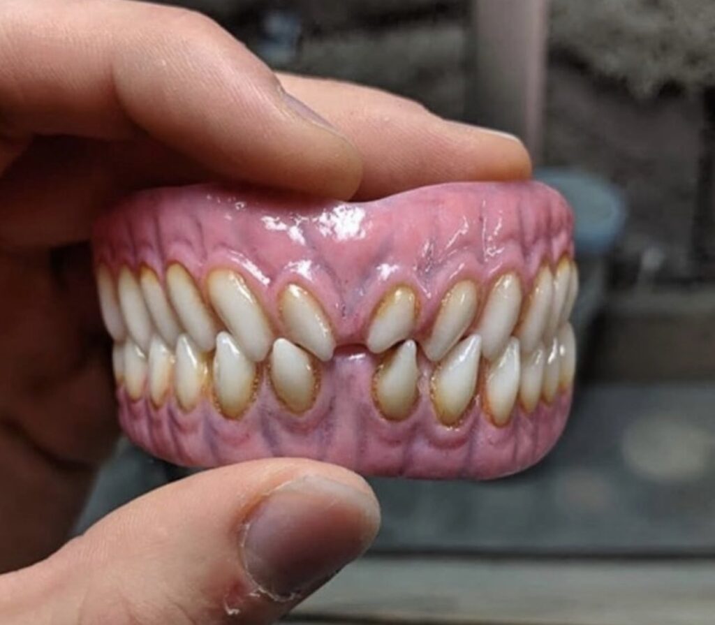 The teeth prosthetic for Mr Vup