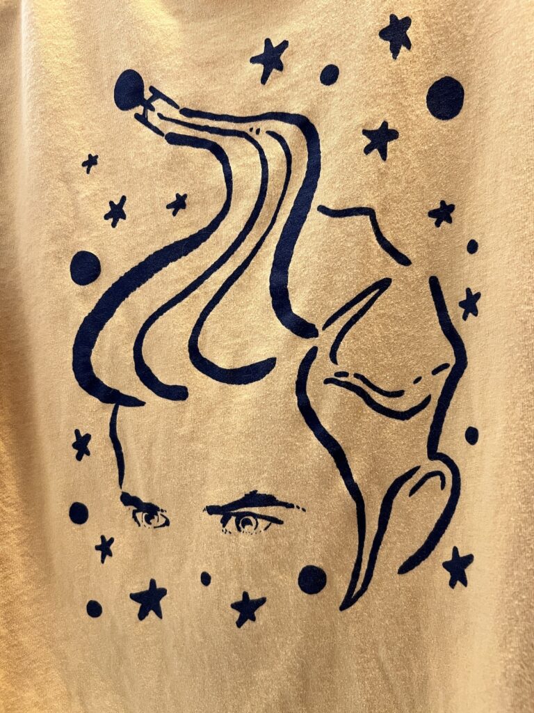 A fanciful drawing of Captain Pike on a tee shirt. The drawing highlights his very big hair.