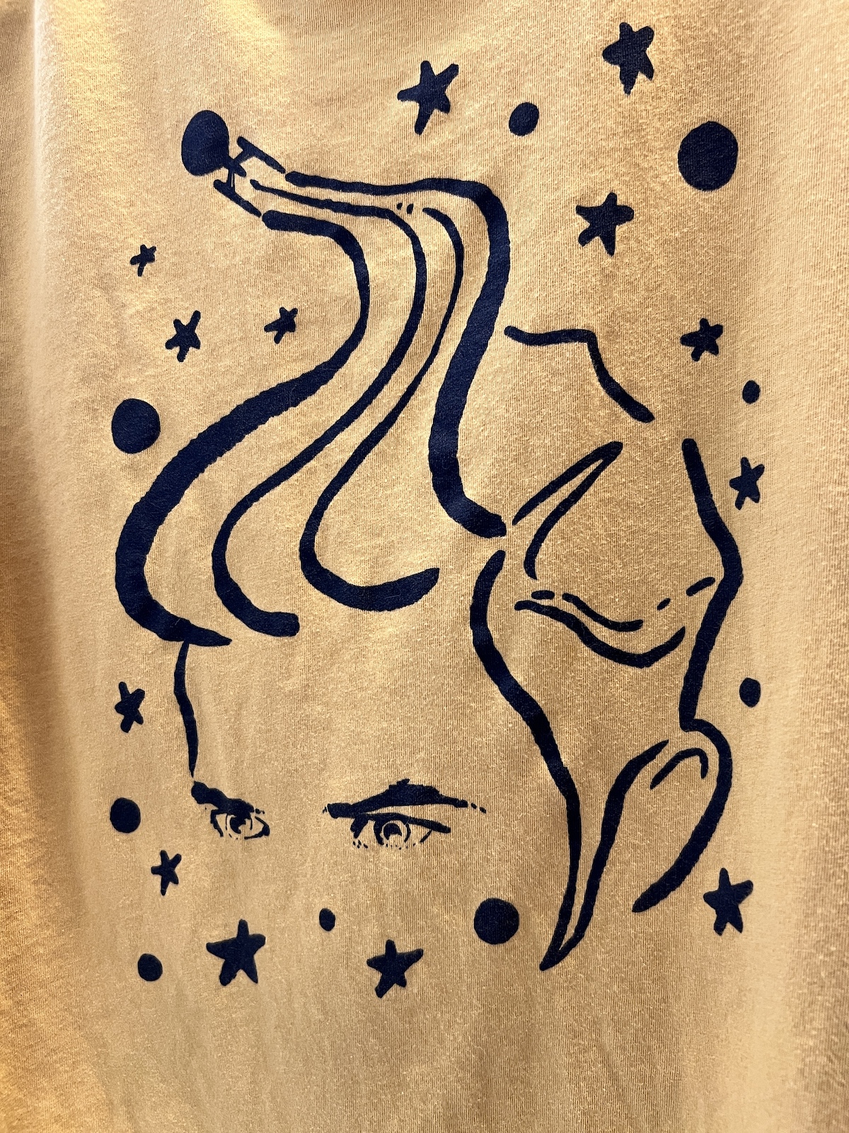 A fanciful drawing of Captain Pike on a tee shirt. The drawing highlights his very big hair.
